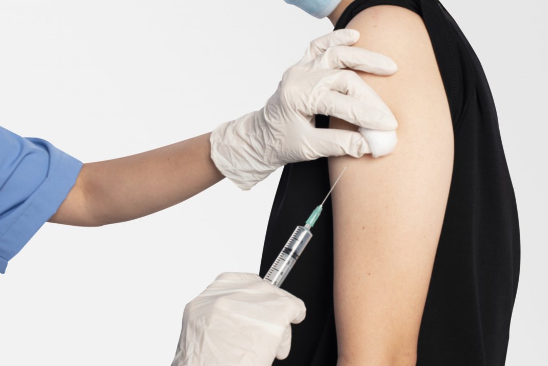 Patient having a vaccination closeup